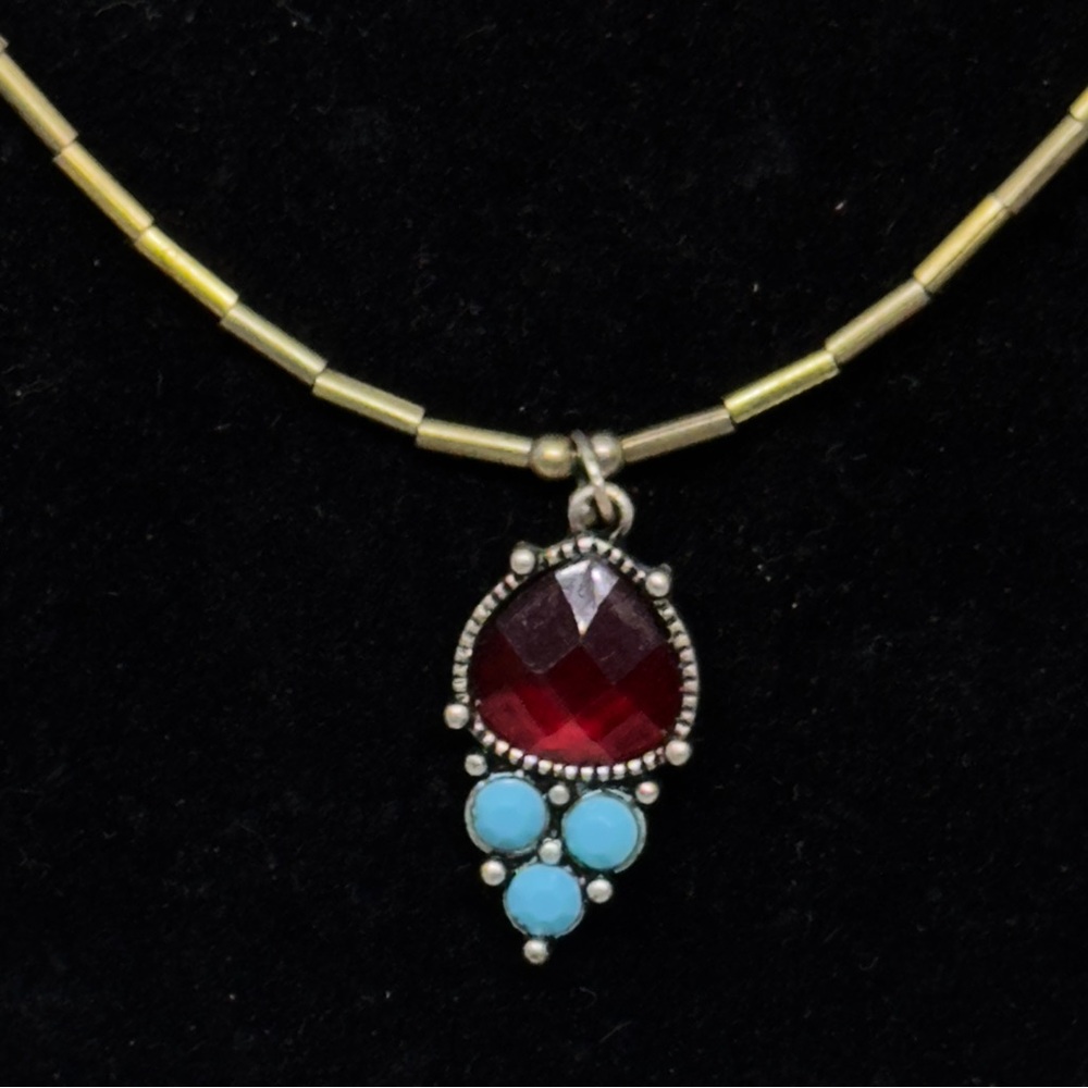 Red and Gold Necklace with Intricate Pendant Design